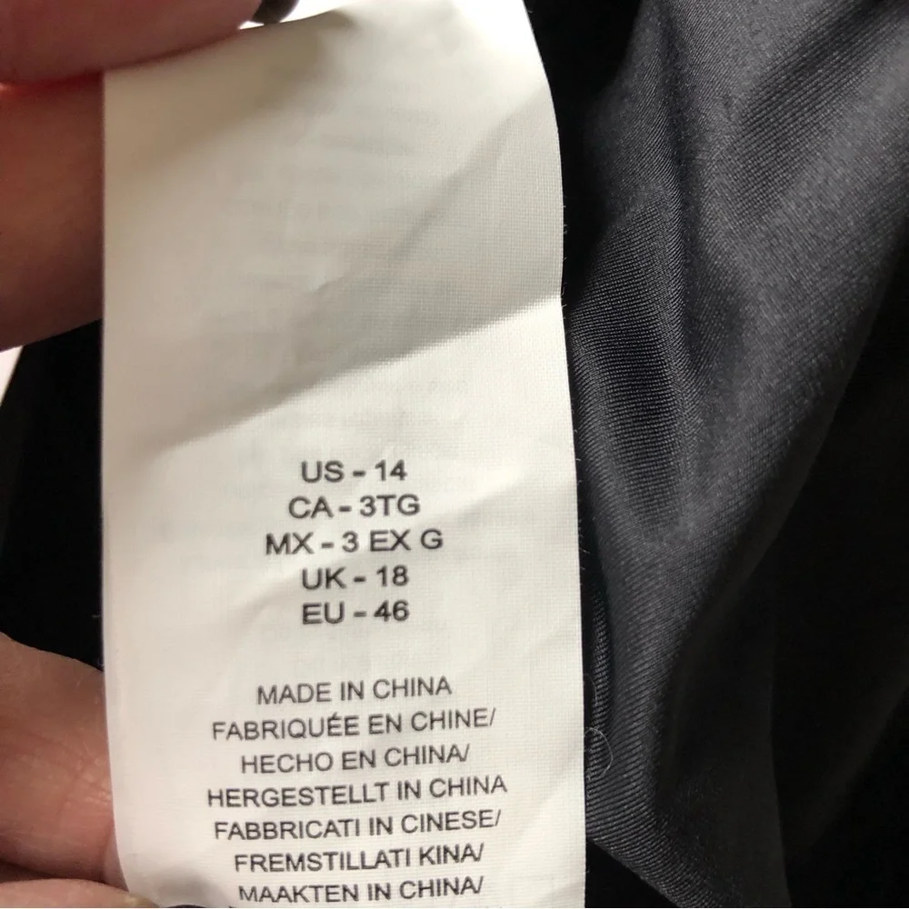 La Blanca swimsuit tags shoulder